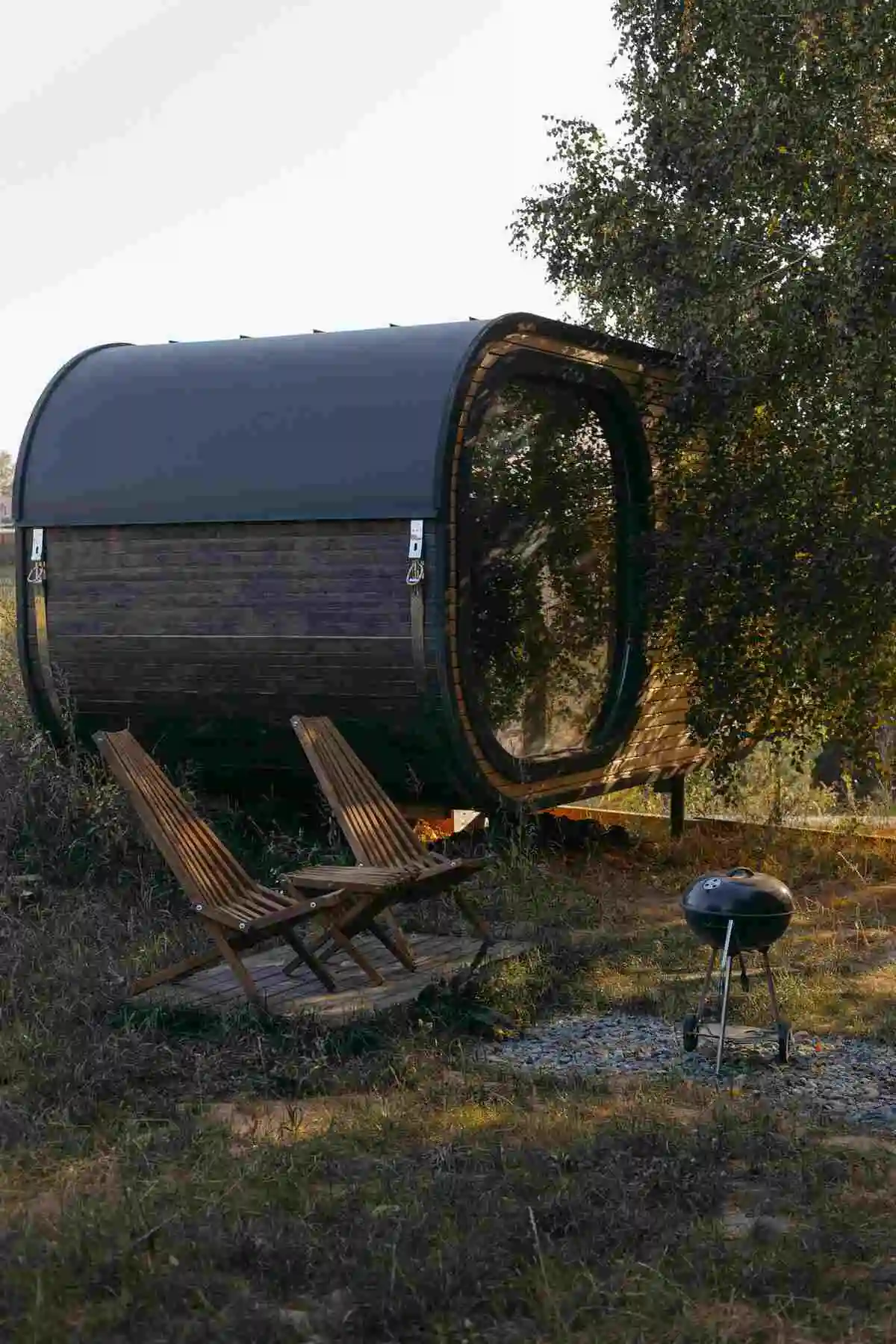A cozy outdoor sauna cabin in nature—exploring if sauna is good when sick.